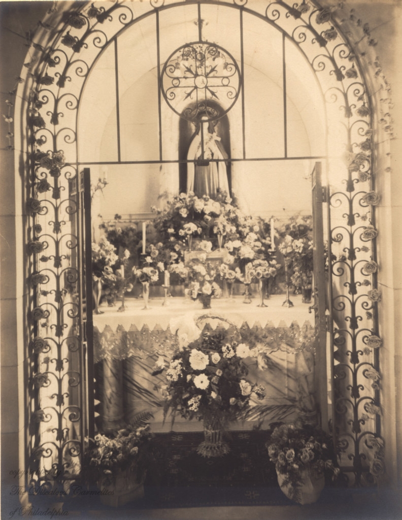 Therese Shrine w flowers